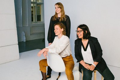 Marietta Angeli sitting (left) with Jessica Lampe standing and the third science nominee    © Niko Havranek for Forbes